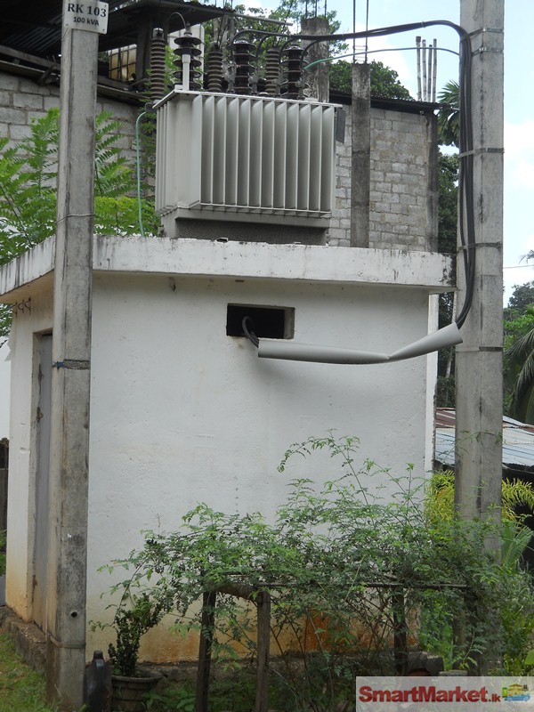 Land & a  building for sale with 100KVA transform