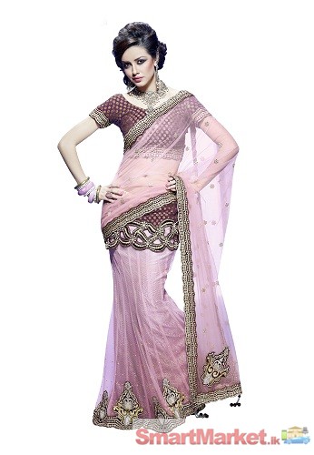 Manufacturer of Indian women ethnic wear such as saree, dress material,kurtis, lahenga choli etc