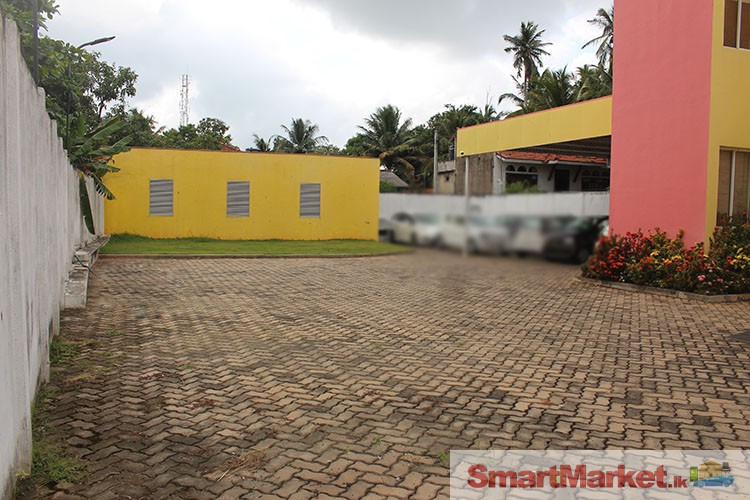 Commercial Land with Building for Sale at Kattuwa, Kochchikade.