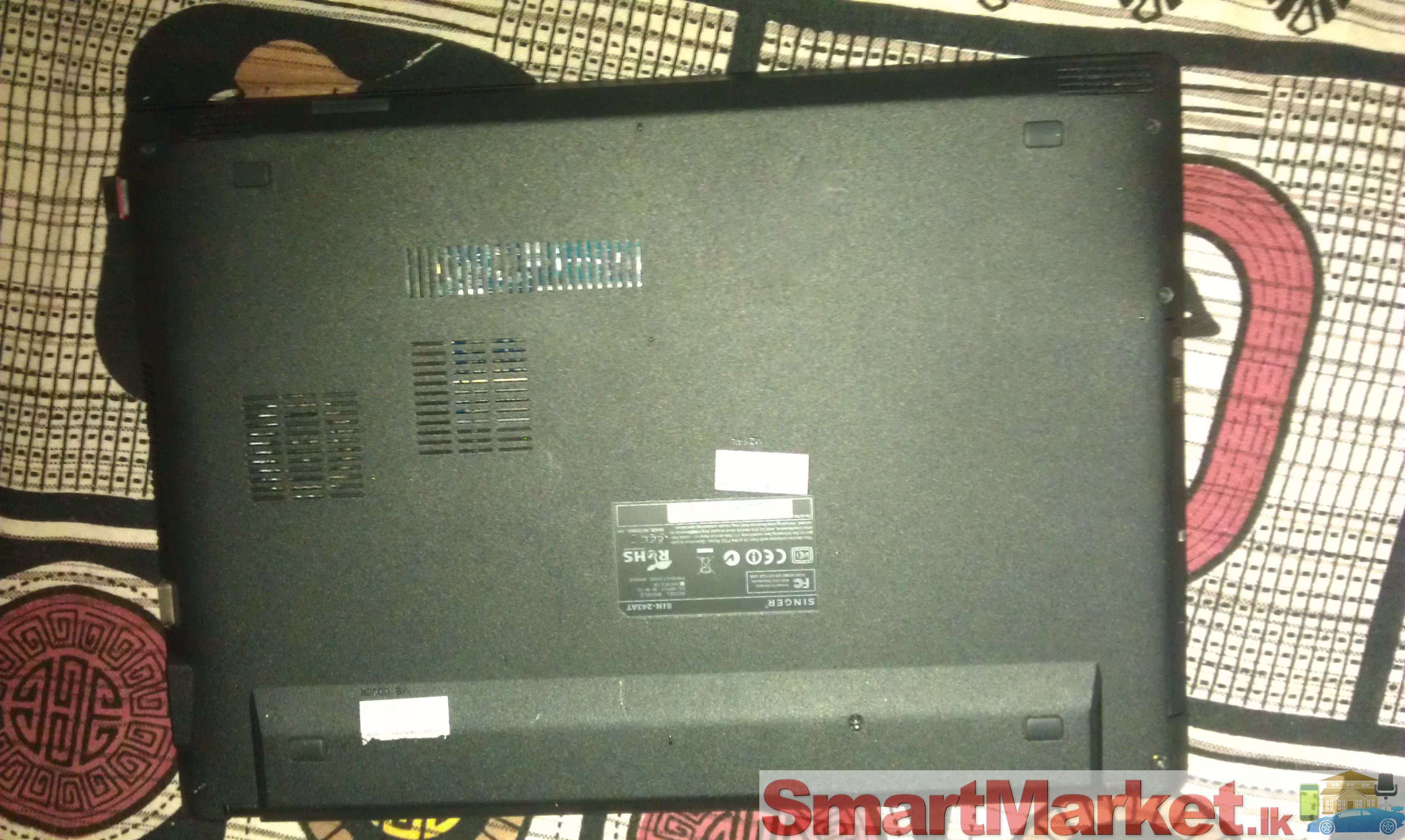 USED SINGER SINX-243AT LAPTOP FOR SALE